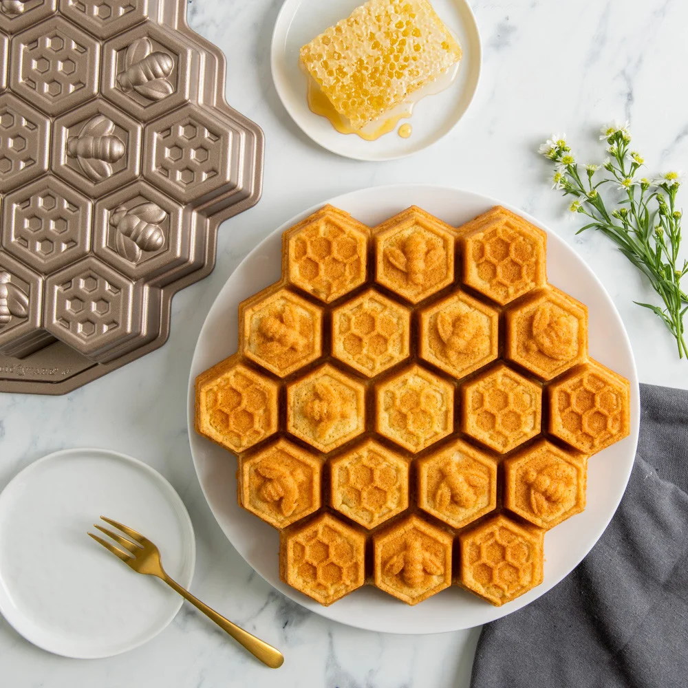 Maker cake-and-pan serving example; food and props are not included.