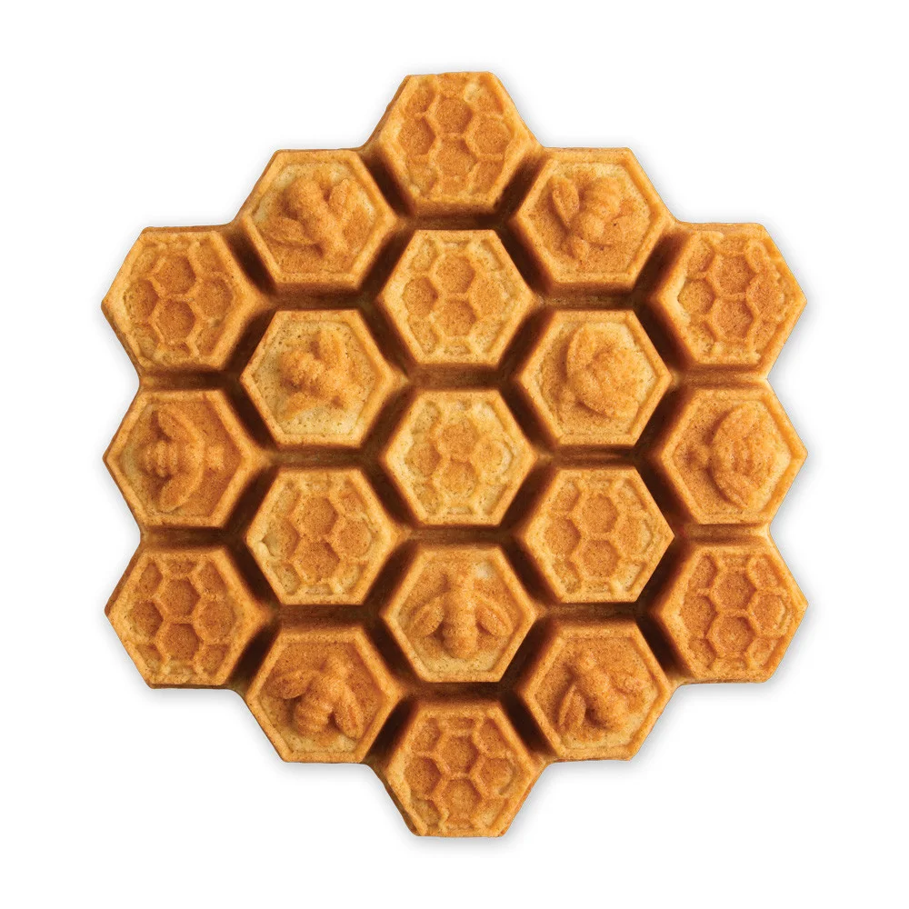 Finished honeycomb cake showing the pattern without a serving plate.