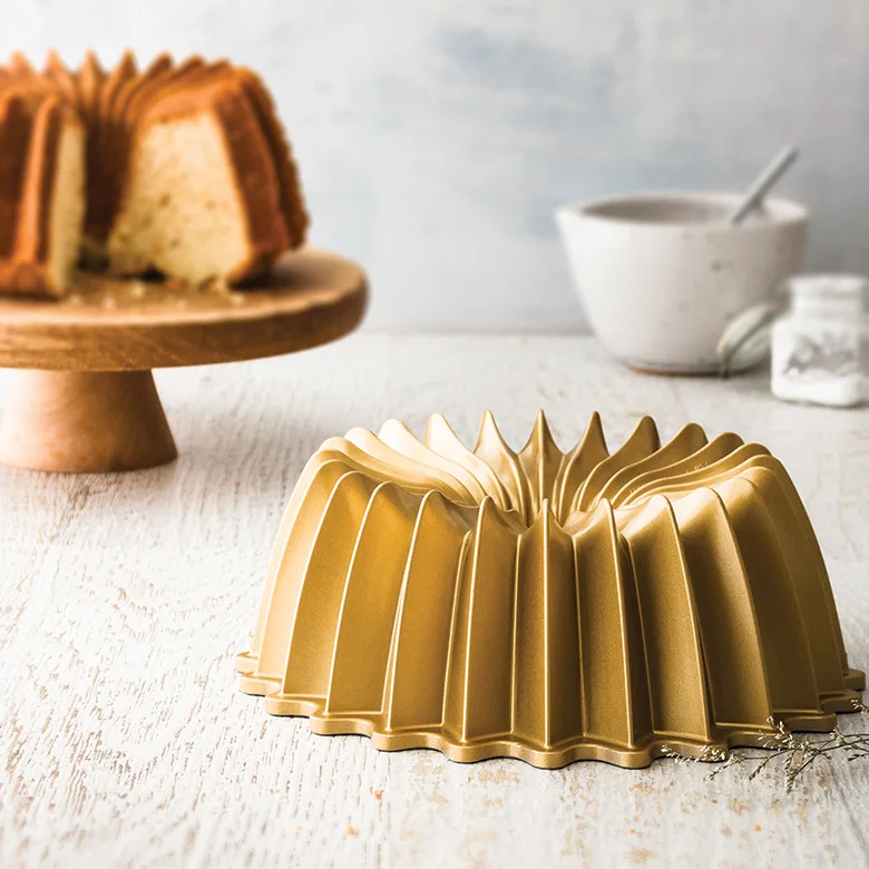 Gold Brilliance exterior with cake in the background.