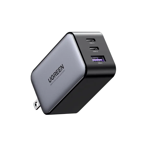 Black three-port charger with folding US-style prongs.