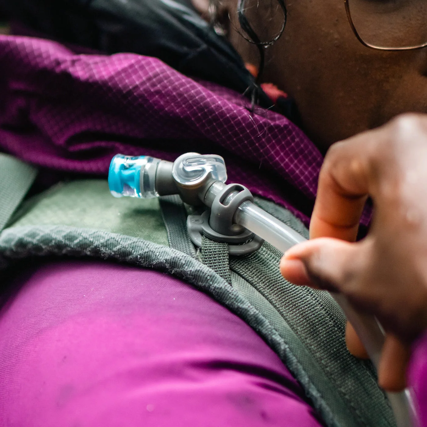 Close view of a hose clip and drinking end; a brand setup reference.