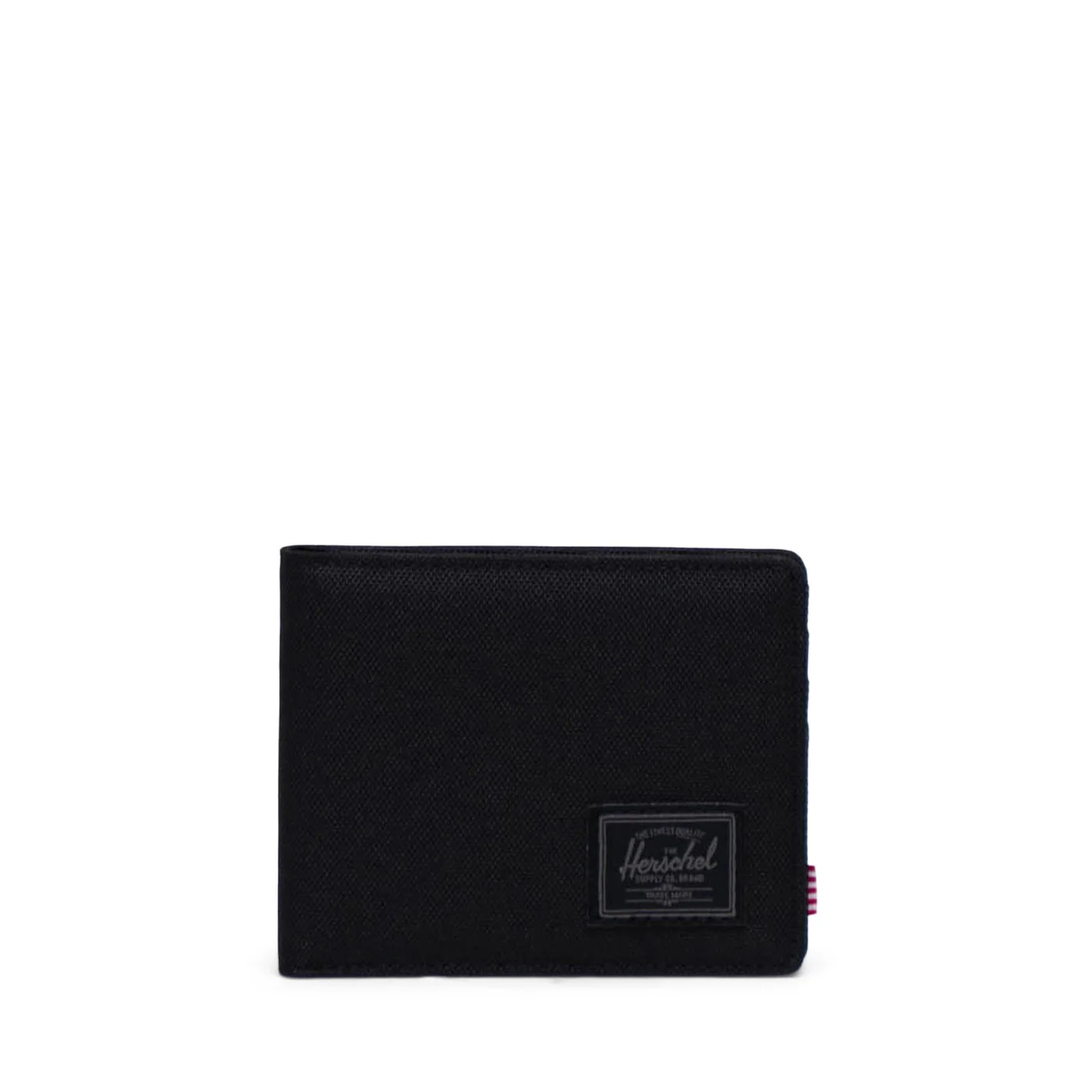 Selected Black Tonal Roy: quiet dark exterior badge.