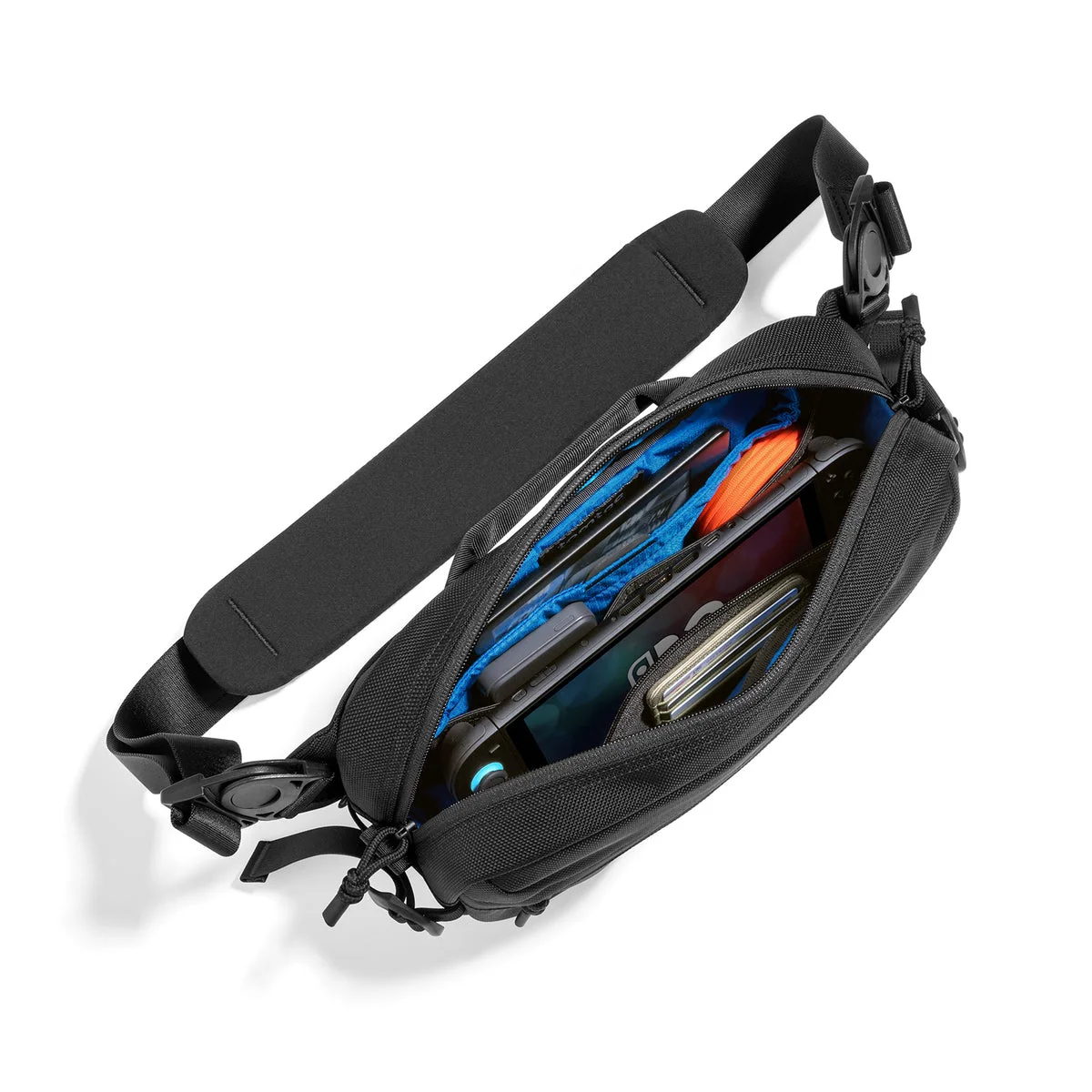 Maker open-bag packing reference showing blue interior and electronics; contents not included.