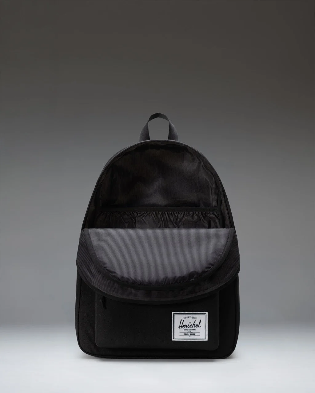 Standard Black ClassicXL open main compartment and laptop sleeve; selected finish is Black Tonal.