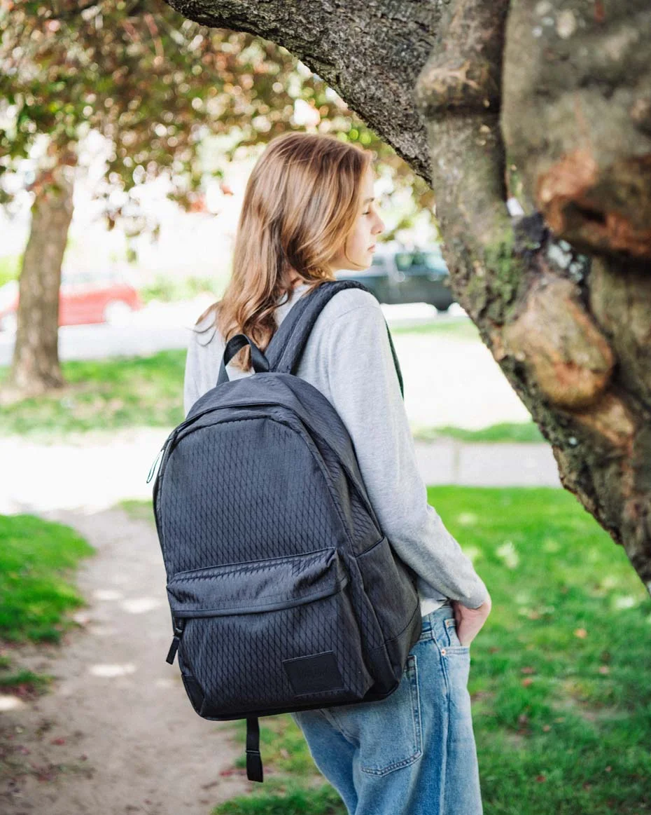 Alternative Navy ClassicXL shoulder-carry reference showing its everyday shape.