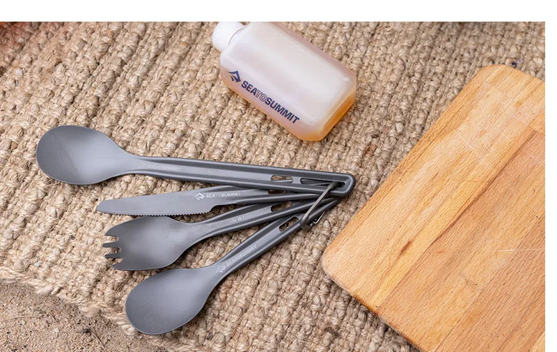 Staged table setting shows other utensils as well; only the selected three-piece set is included.