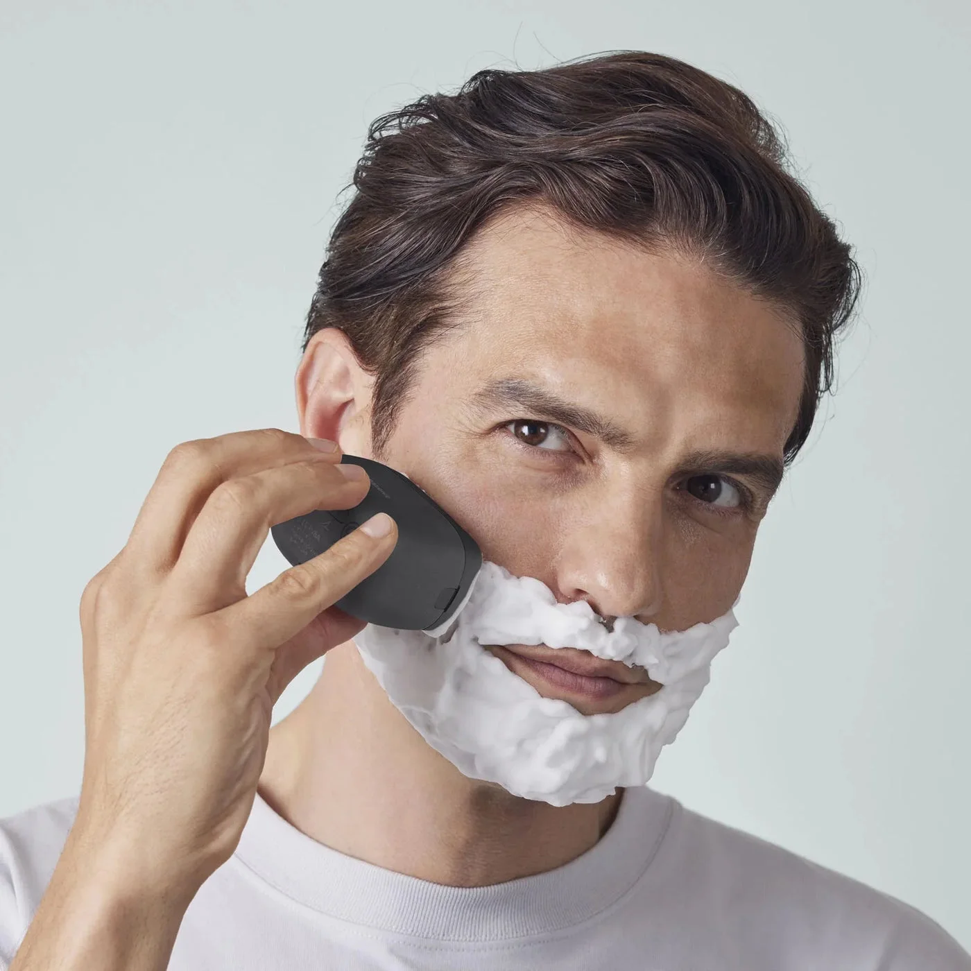 Wet-shaving reference with the Black model; check the manual for suitable products.