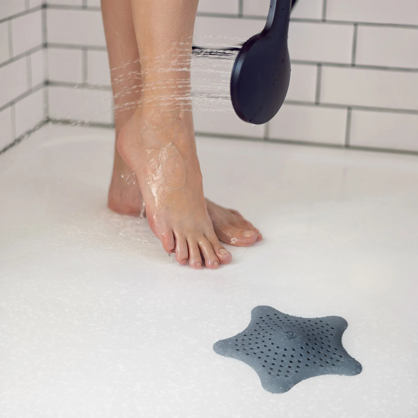 Maker shower scene with Slate Blue cover; surrounding shower fittings and cleansing tool are not included.