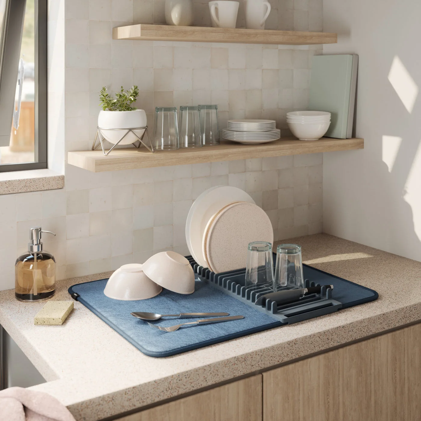 Manufacturer countertop scene showing the low-profile drying arrangement.