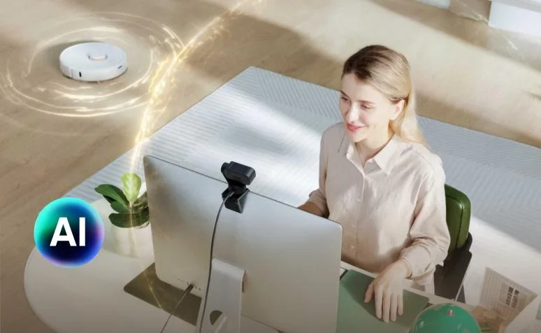 Manufacturer camera-and-laptop scene; software noise processing is not independently tested here.