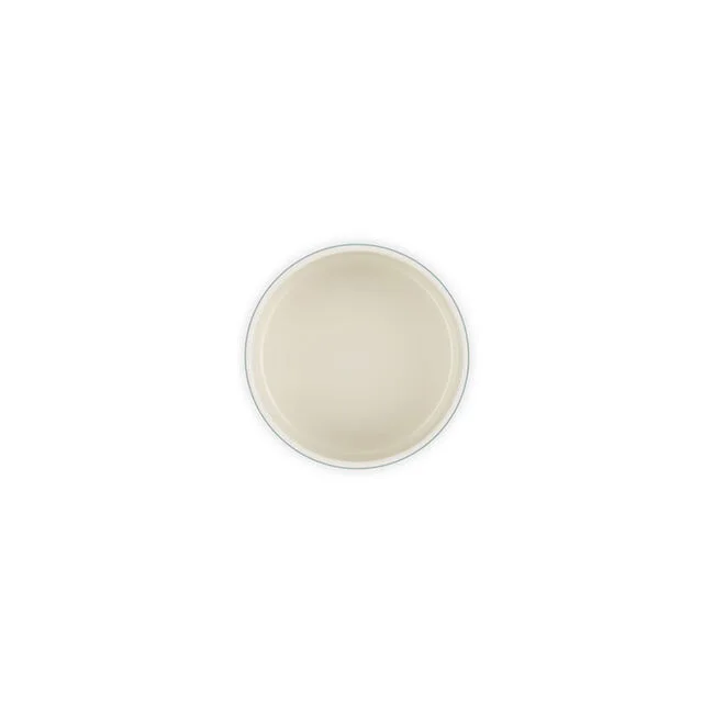 Open canister showing its light glazed interior.