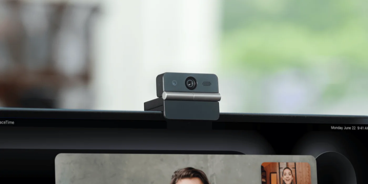 Meet Flip positioned on a monitor; compare the screen thickness and bezel before buying.