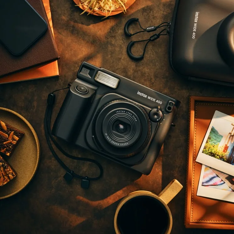 INSTAX WIDE 400 Instant Camera Sage Green — manufacturer gallery view 8 — alternate colour shown to illustrate shared controls and use; the selected listing is Sage Green.