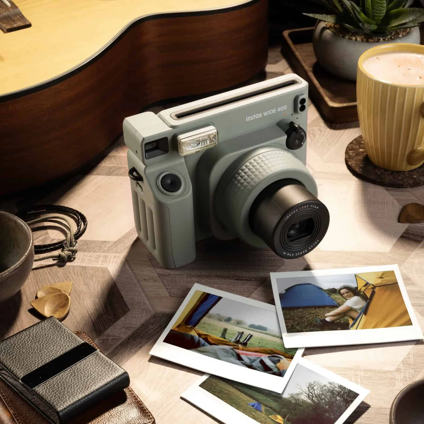 INSTAX WIDE 400 Instant Camera Sage Green — manufacturer gallery view 9 — alternate colour shown to illustrate shared controls and use; the selected listing is Sage Green.