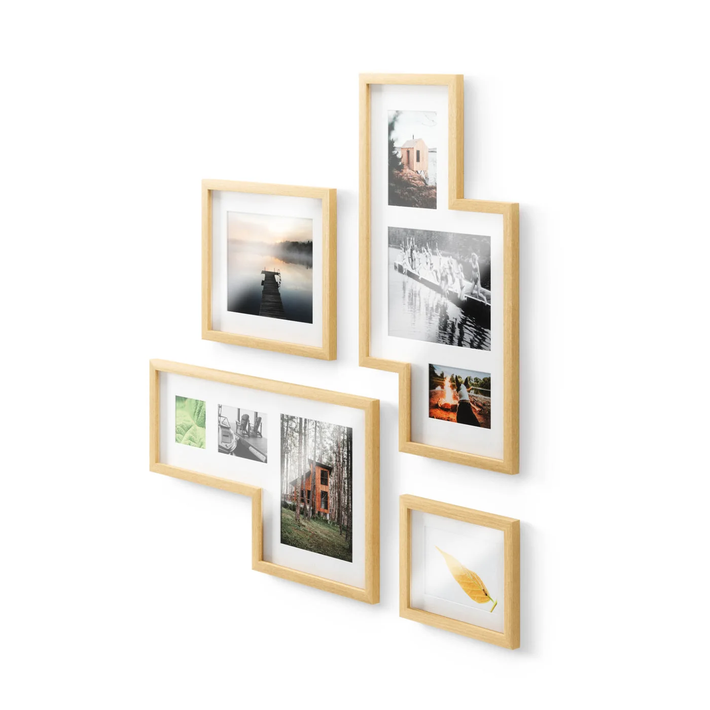 four natural-finish frames with example prints