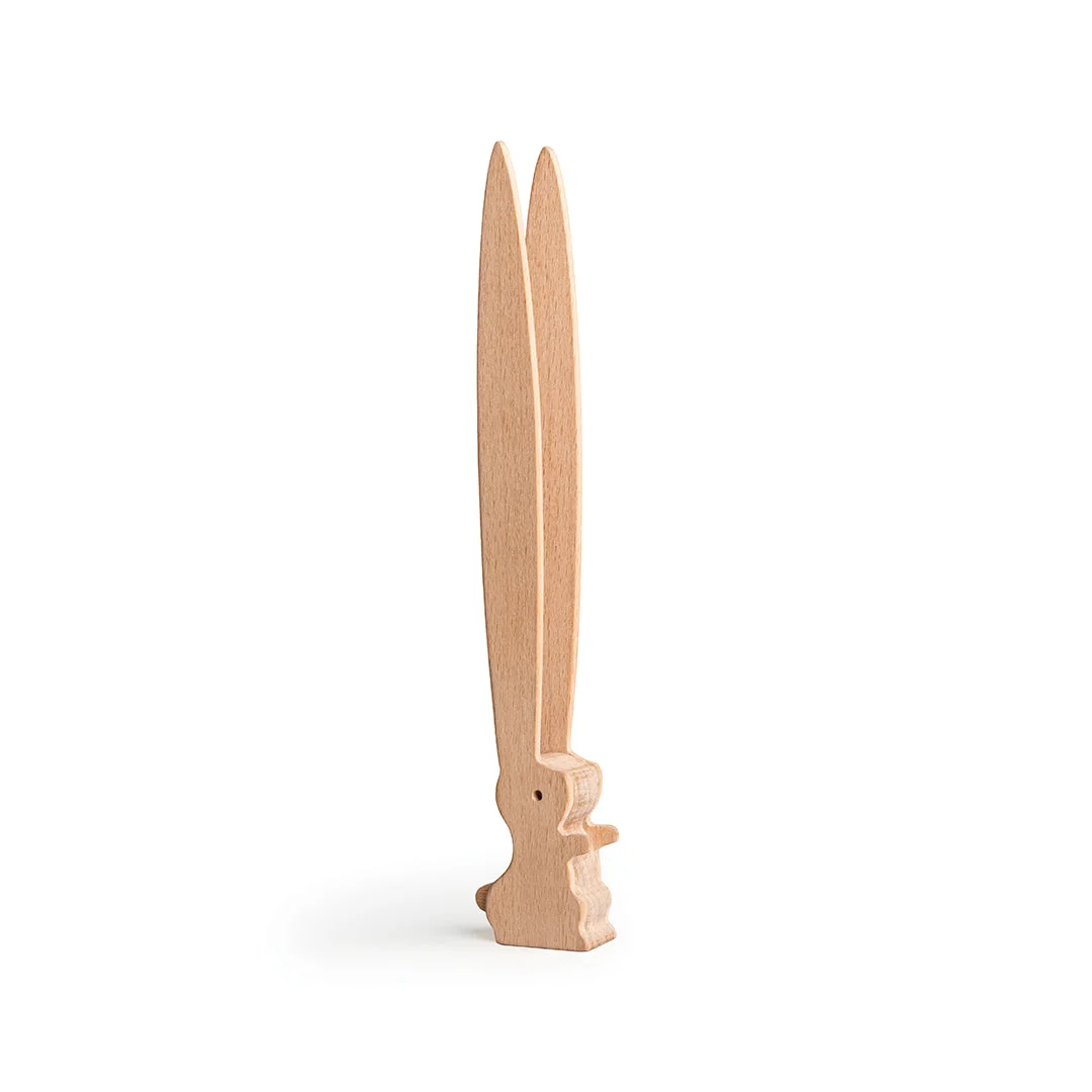 wooden bunny-ear tongs upright
