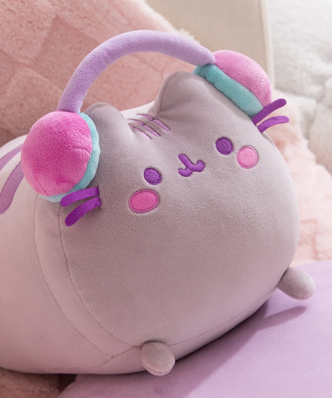 embroidered face, headphones and pink cheeks